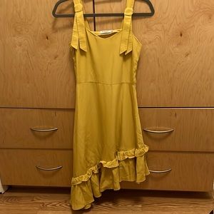 Sleeveless style,lightweight chiffon fabric asymmetrical ruffled skirt